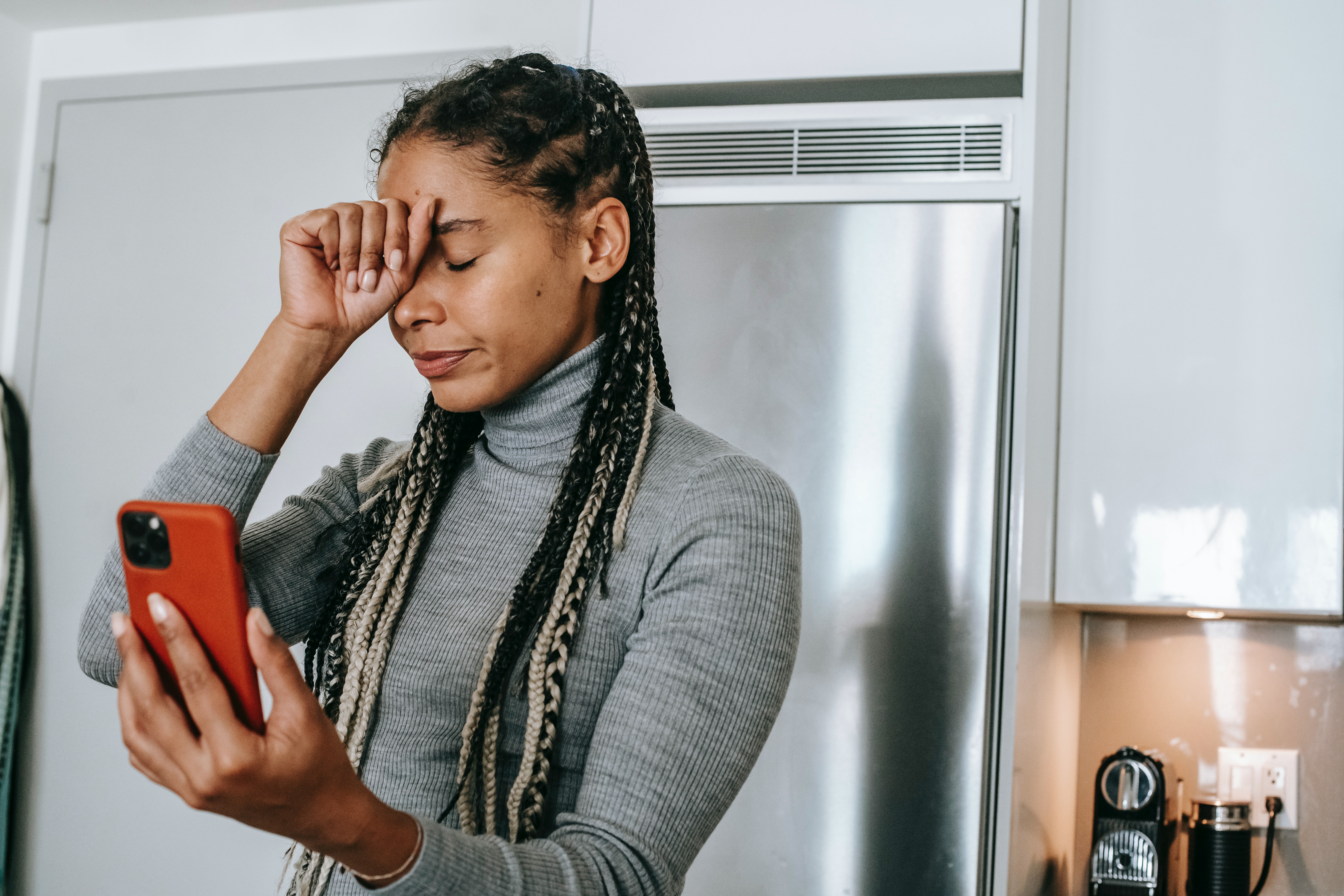 Woman having problems taking video with phone